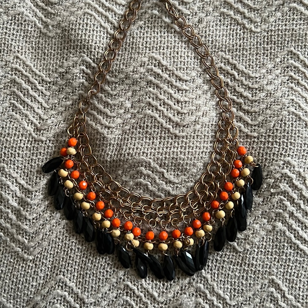 Gold necklace with orange accent 🧡